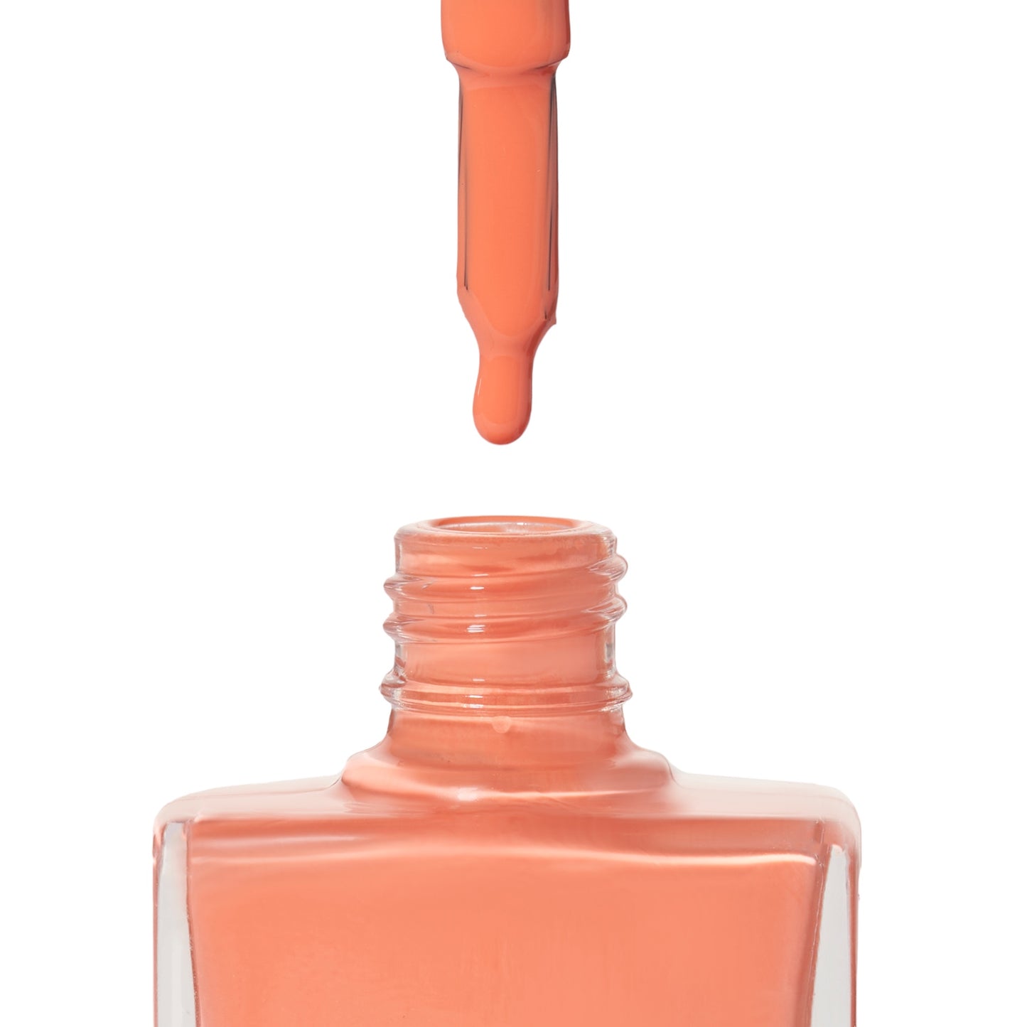 A bottle of Ibizan Sunset, an orange shade from True Nail Polish
