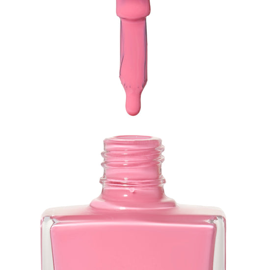 A bottle of Aloha, a bright pink shade from True Nail Polish