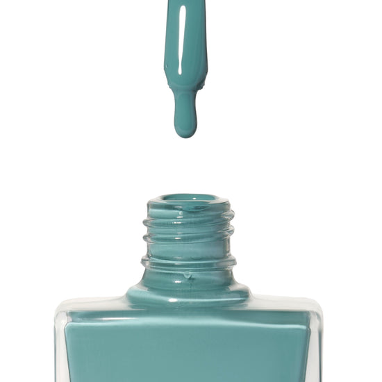 A bottle of Rock Pool, a dark teal shade from True Nail Polish