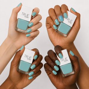 Manicure wearing Beach Club turquoise blue nail polish by TRUE Nail Polish with a glossy gel-effect finish, perfect for summer holidays and beach-inspired nails.