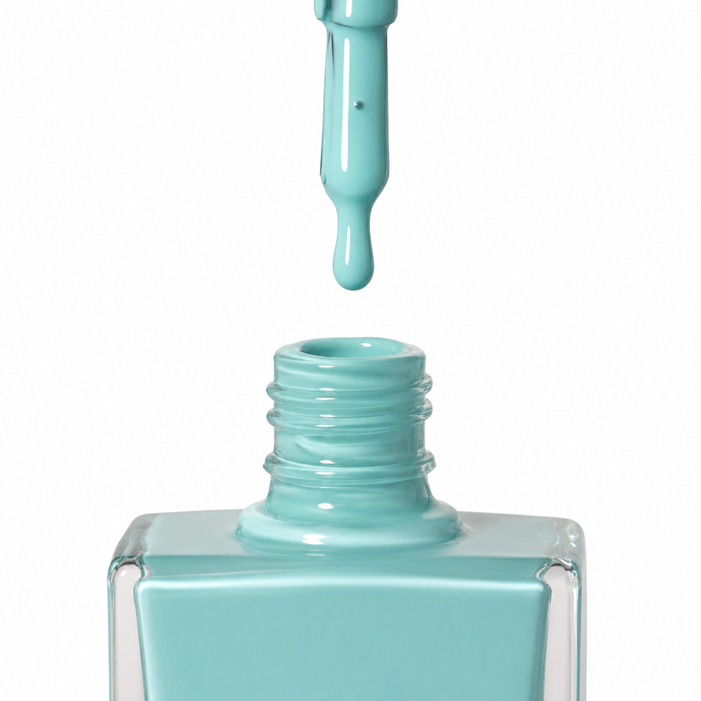 Bottle of Beach Club turquoise blue vegan nail polish by TRUE Nail Polish with a glossy gel-effect finish, vibrant colour and long-lasting chip-resistant formula.