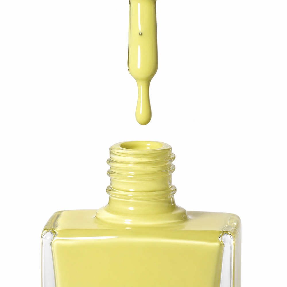 Bottle of Bikini bright yellow vegan nail polish by TRUE Nail Polish with a glossy gel-effect finish, vibrant colour and long-lasting chip-resistant formula.