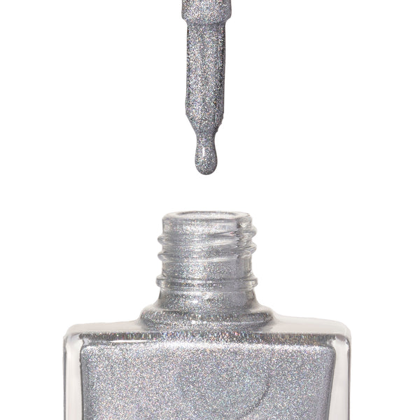 A bottle of Phenomenon, a silver holographic glitter shade from True Nail Polish