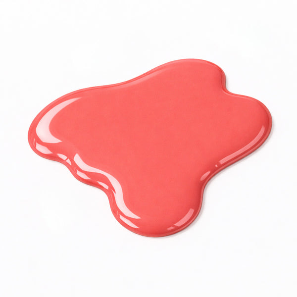 Nail swatch of Devotion showing rich coral colour with a glossy gel-like shine and smooth full-coverage finish.