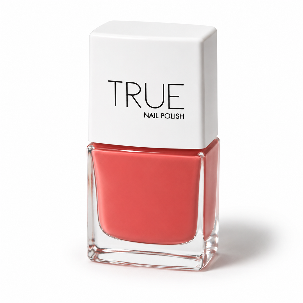 Bottle of Devotion coral vegan nail polish by TRUE Nail Polish with a glossy gel-effect finish and long-lasting chip-resistant formula.