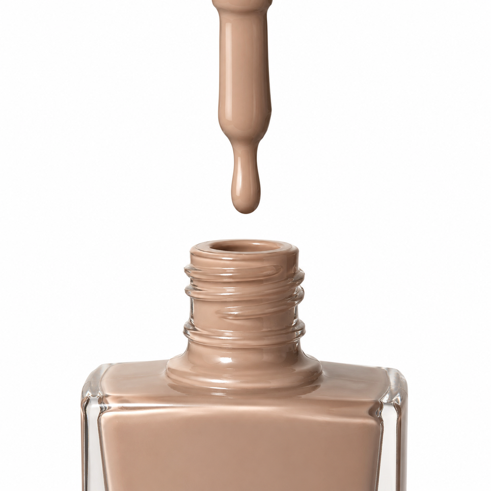 Bottle of Empathy cocoa brown, latte brown, nude ,taupe vegan nail polish by TRUE Nail Polish with a glossy gel-effect finish and long-lasting chip-resistant formula.