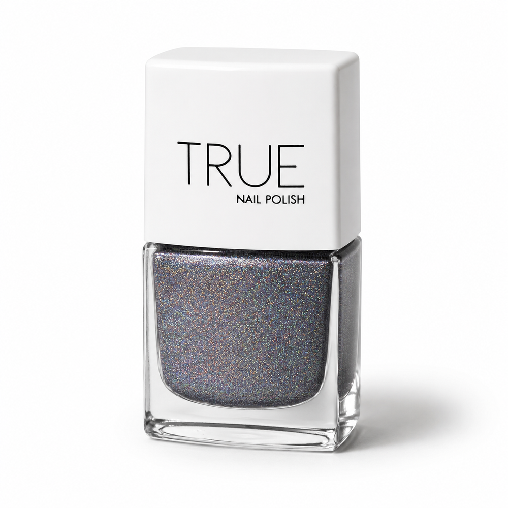 Bottle of Extravaganza dark grey, holographic glitter vegan nail polish by TRUE Nail Polish with dazzling sparkle, glossy gel-effect finish and long-lasting chip-resistant formula.