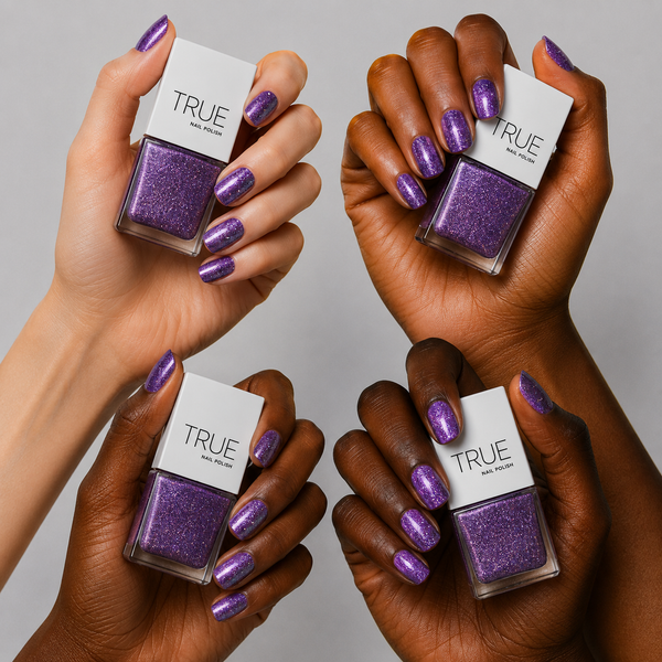 Manicure wearing Goddess purple glitter nail polish by TRUE Nail Polish with a glossy gel-effect finish, perfect for parties, weddings, festivals and glamorous occasions.