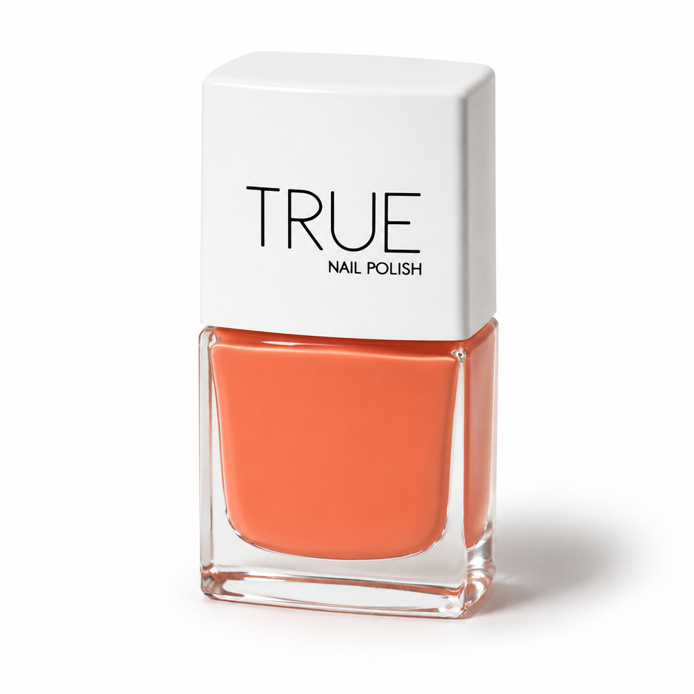 Bottle of Ibizan Sunset coral orange vegan nail polish by TRUE Nail Polish with a glossy gel-effect finish and long-lasting chip-resistant formula.