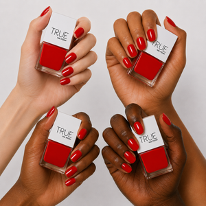 Manicure wearing Lipstick On Your Collar classic red nail polish by TRUE Nail Polish with a glossy gel-effect finish, perfect for parties, weddings, festive occasions and everyday elegance.