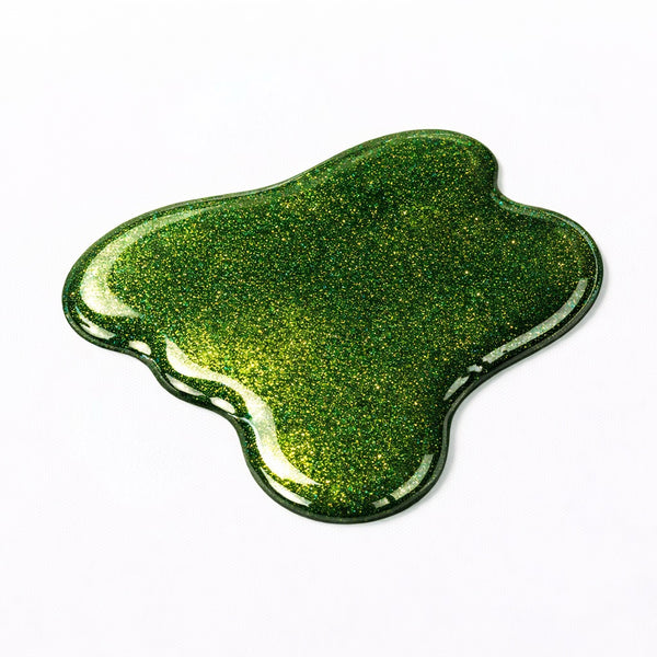 Nail swatch of Lucky Charm showing rich emerald green glitter with multi-dimensional sparkle and a glossy gel-like finish.