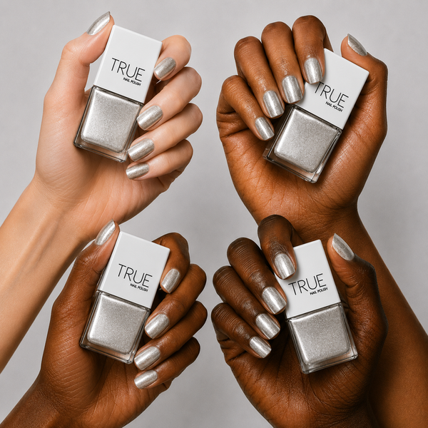 Manicure wearing Mirror Mirror silver glitter nail polish by TRUE Nail Polish with a glossy gel-effect finish, perfect for parties, weddings and festive celebrations.