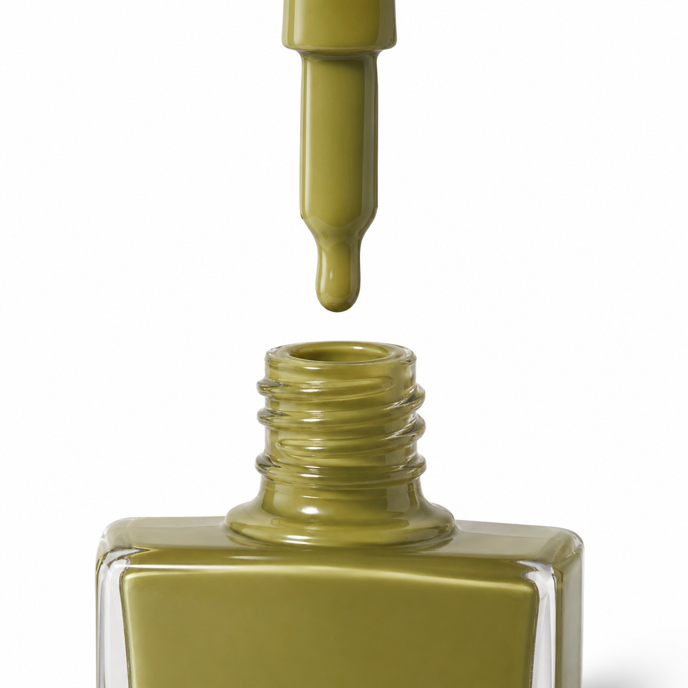 Bottle of Outlaw khaki green vegan nail polish by TRUE Nail Polish with a glossy gel-effect finish and long-lasting chip-resistant formula.