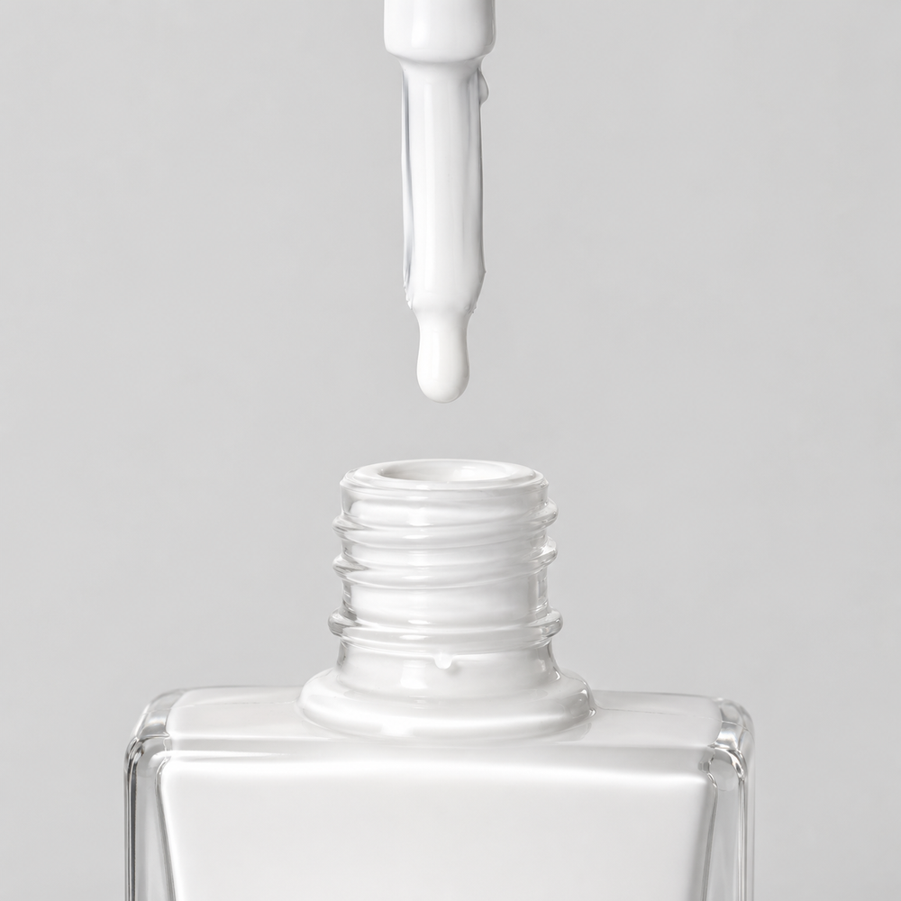 Bottle of Santorini bright white vegan nail polish by TRUE Nail Polish with a glossy gel-effect finish and long-lasting chip-resistant formula.