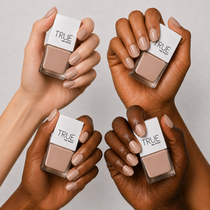 Manicure wearing Sentimental soft nude nail polish by TRUE Nail Polish with a glossy gel-effect finish, perfect for weddings, work and elegant everyday wear.