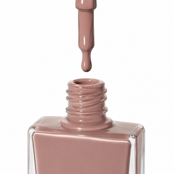 A close-up of a True nail polish bottle filled with sugar and spice, a glossy dusty pink, mink, nude  polish, with the applicator brush above the open bottle showing the same shade of polish on the tip against a white background.