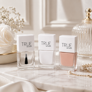 The French Edit French manicure nail polish set by TRUE Nail Polish featuring vegan nude and white nail polishes for creating classic salon-quality French manicures.