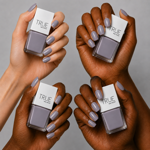 Manicure wearing Wisdom light grey nail polish by TRUE Nail Polish with a glossy gel-effect finish, perfect for office wear, minimalist style and elegant everyday looks.